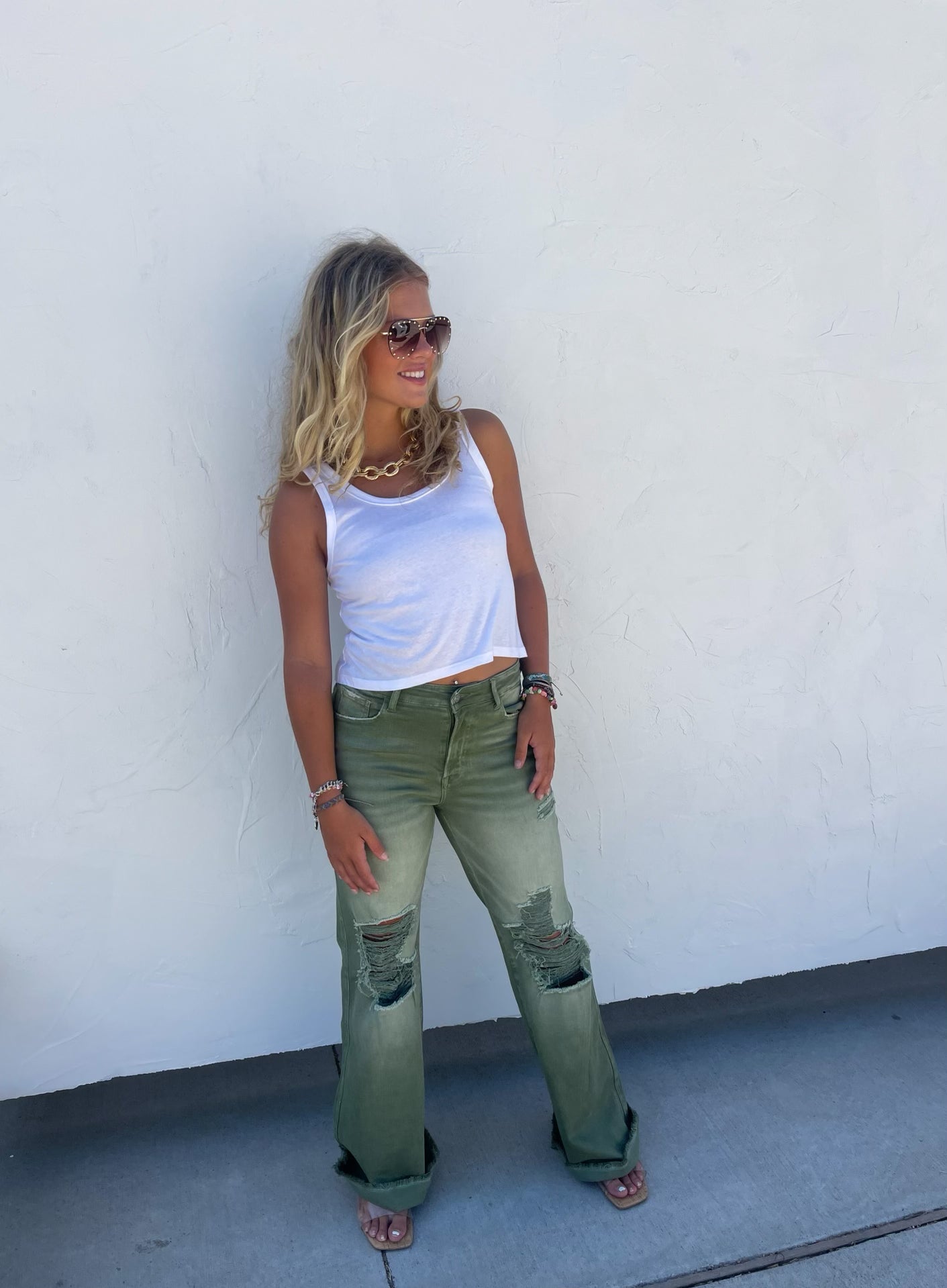 Olive green shop distressed jeans